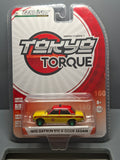 Greenlight Tokyo Torque 1970 Datsun 510 4-Door Sedan Chase Green Wheels (NG16)