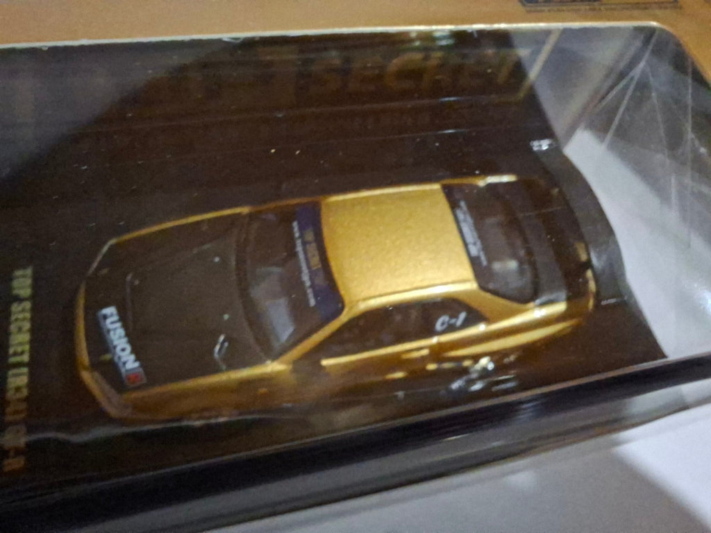 INNO64 Top Secret Nissan Skyline R34 GT-R, gold (CP18)
