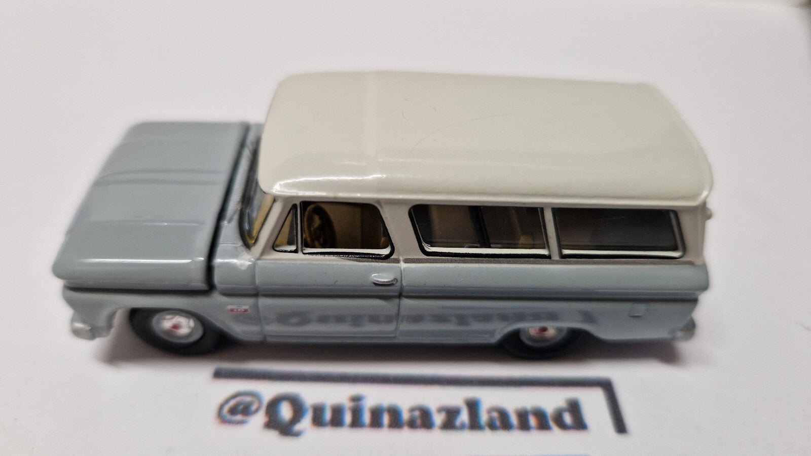 Auto World Premium series 1966 Chevrolet Suburban, gray body with white   (A31)