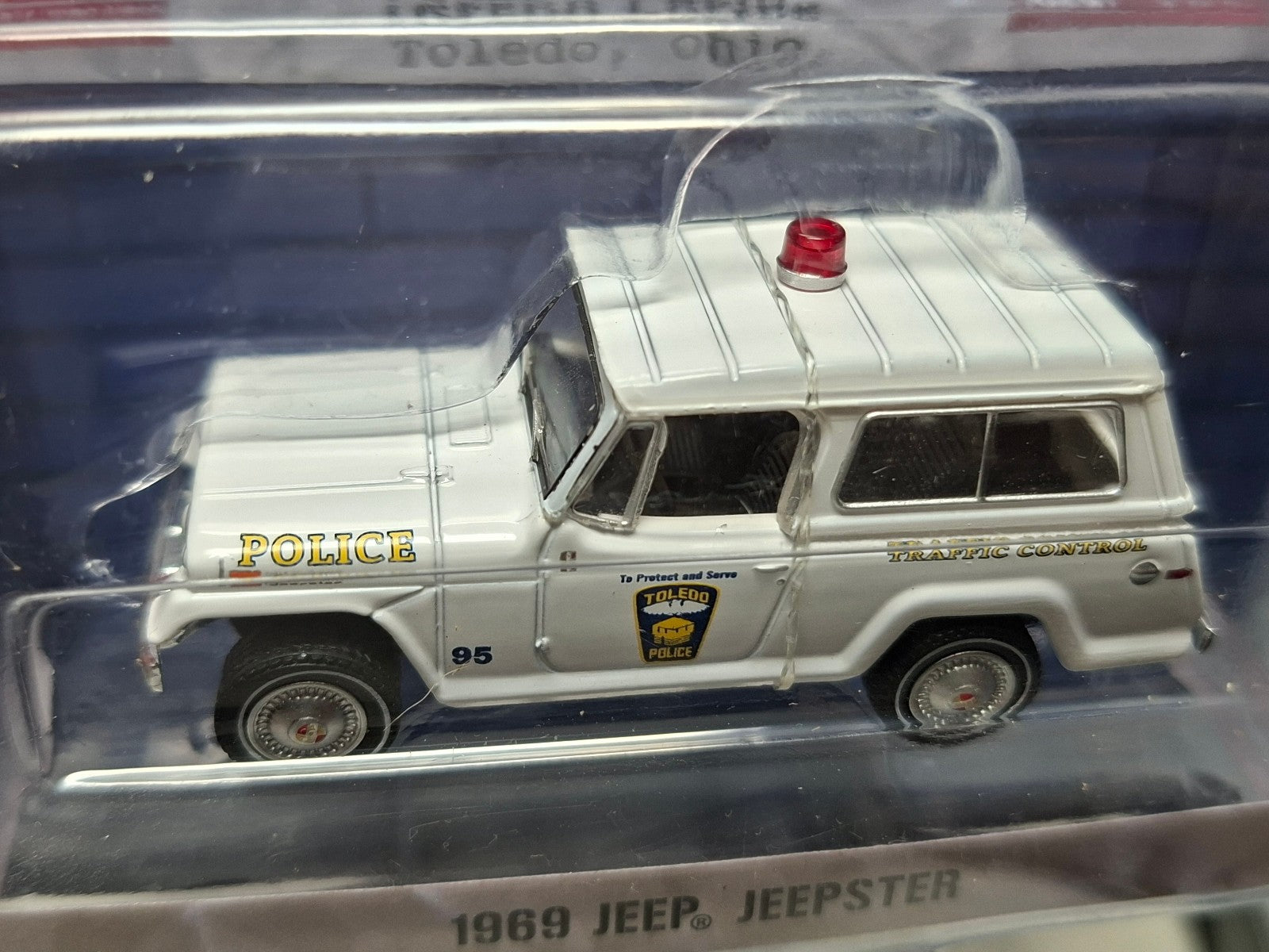 Greenlight Hot Pursuit 1969 Jeep Jeepster  Police Toledo (NG02)