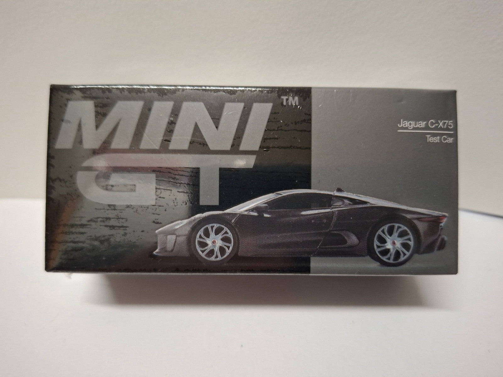 Mini GT 2010 Jaguar C-X75 Test Car, black N°997 (CP07)