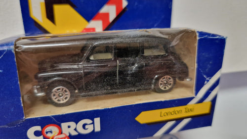Corgi London taxi  boite et bulle abimées (NP14)