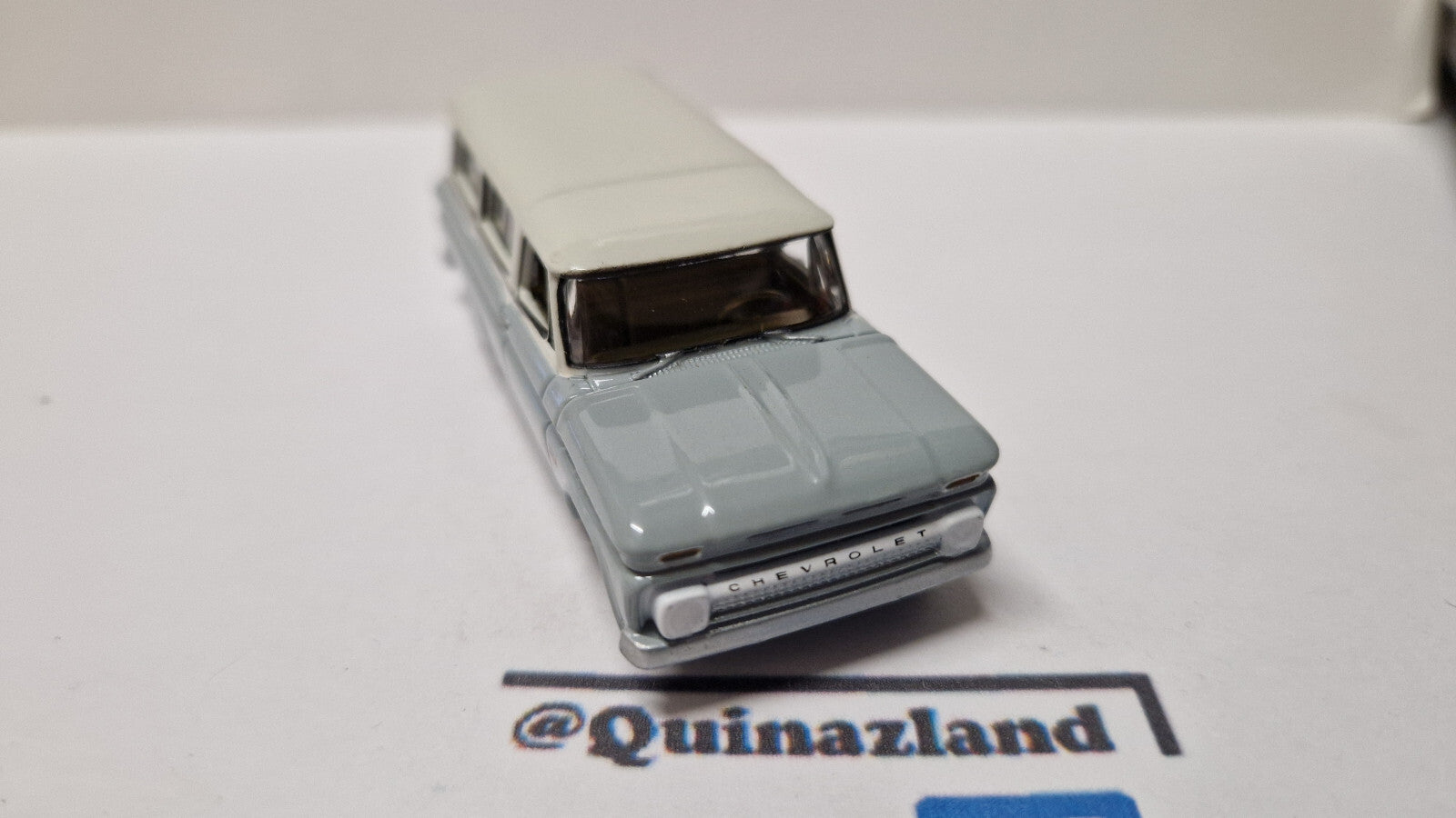Auto World Premium series 1966 Chevrolet Suburban, gray body with white   (A31)