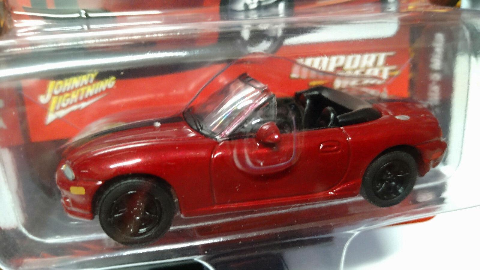 Johnny Lightning Street Freaks Import  '99 Mazda MX-5 Miata base blanche (NG05)