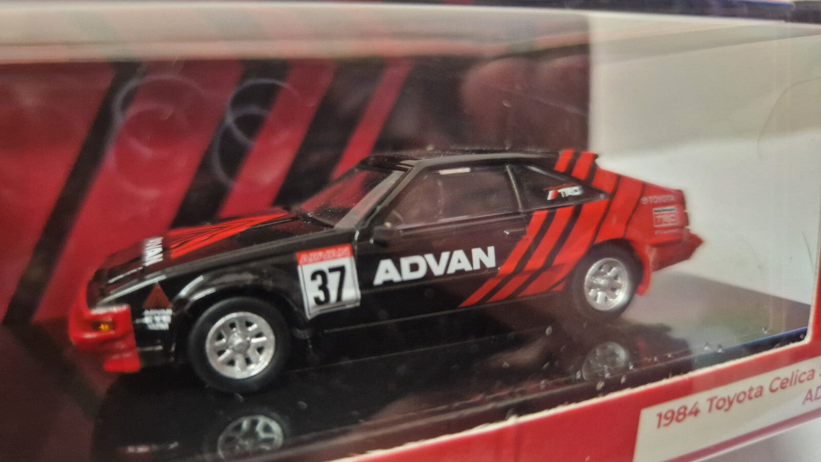 Para64 1984 Toyota Celica Supra ADVAN, red/black  (NP17)