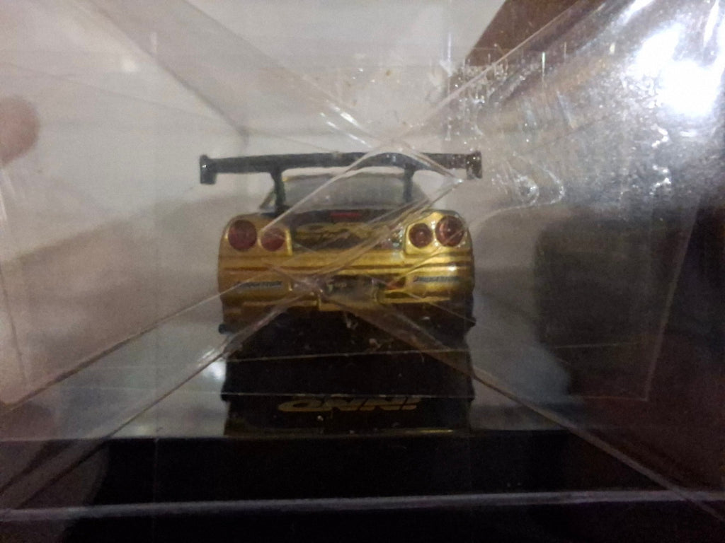 INNO64 Top Secret Nissan Skyline R34 GT-R, gold (CP18)