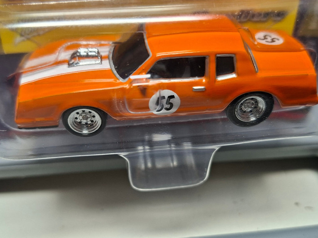 Johnny Lightning Street Freaks Spoilers Chevy Monte Carlo base blanche (NG04)