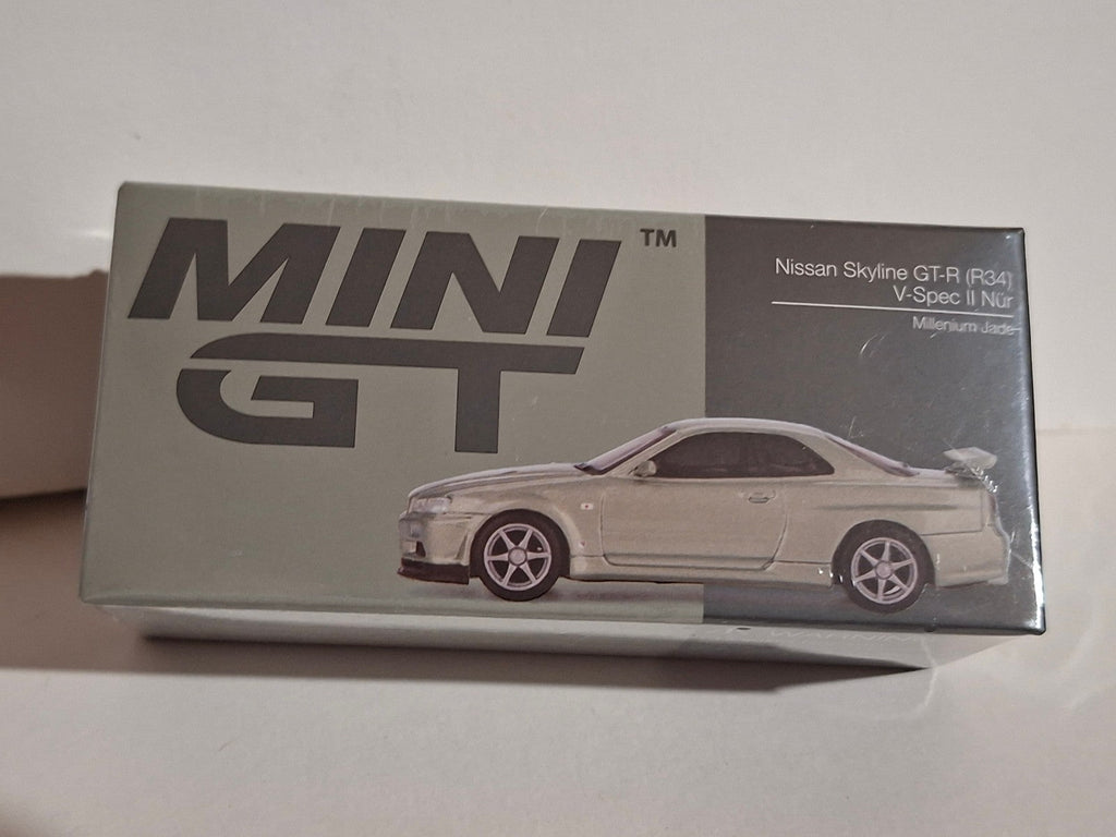 Mini GT 2002 Nissan Skyline GT-R R34 V-Spec II Nur millenium jade  n°1003 (CP17)