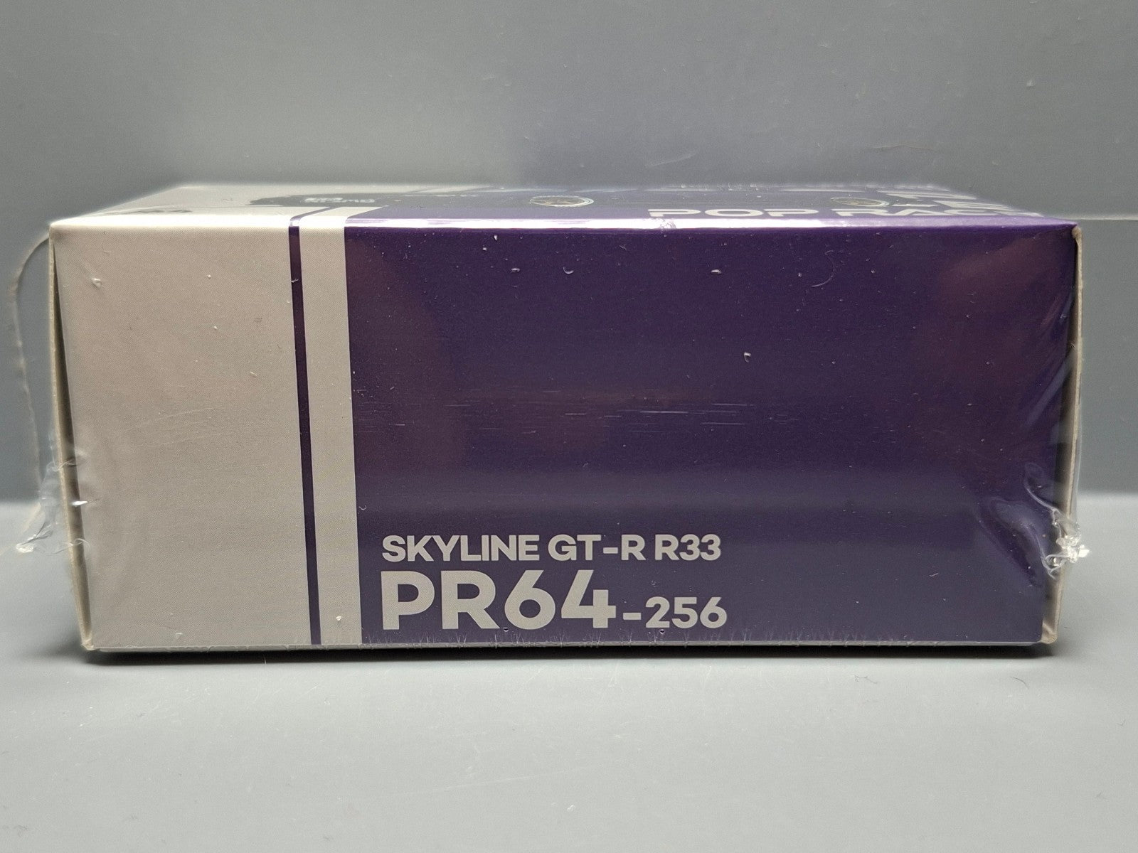 Pop Race 1/64 Nissan Skyline GT-R R33 Nismo Midnight Purple (CP06)
