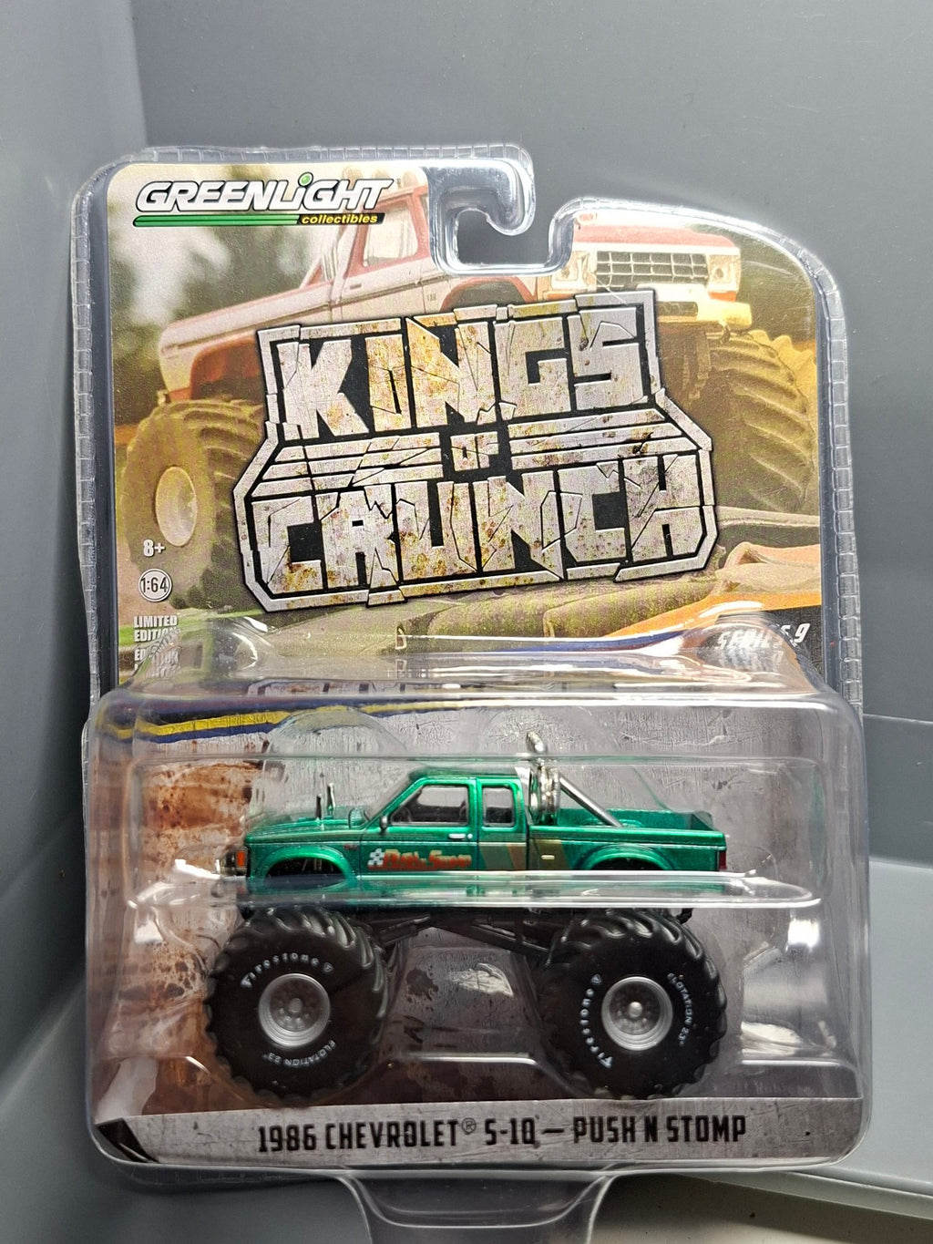 Greenlight Chase 1986 Chevrolet S-10 Push N Stomp King of Crunch (NG25)
