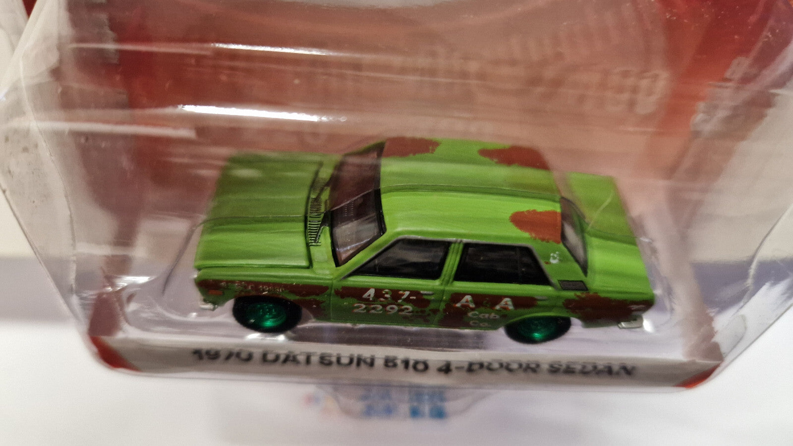 Greenlight Tokyo Torque 1970 Datsun 510 4 door sedan Chase (NG27)