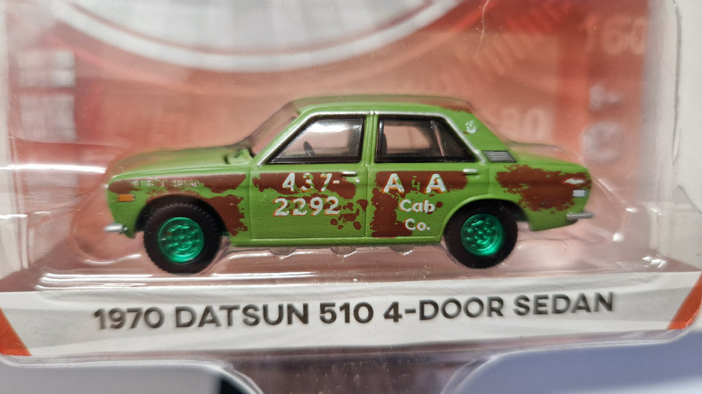 Greenlight Tokyo Torque 1970 Datsun 510 4 door sedan Chase (NG27)