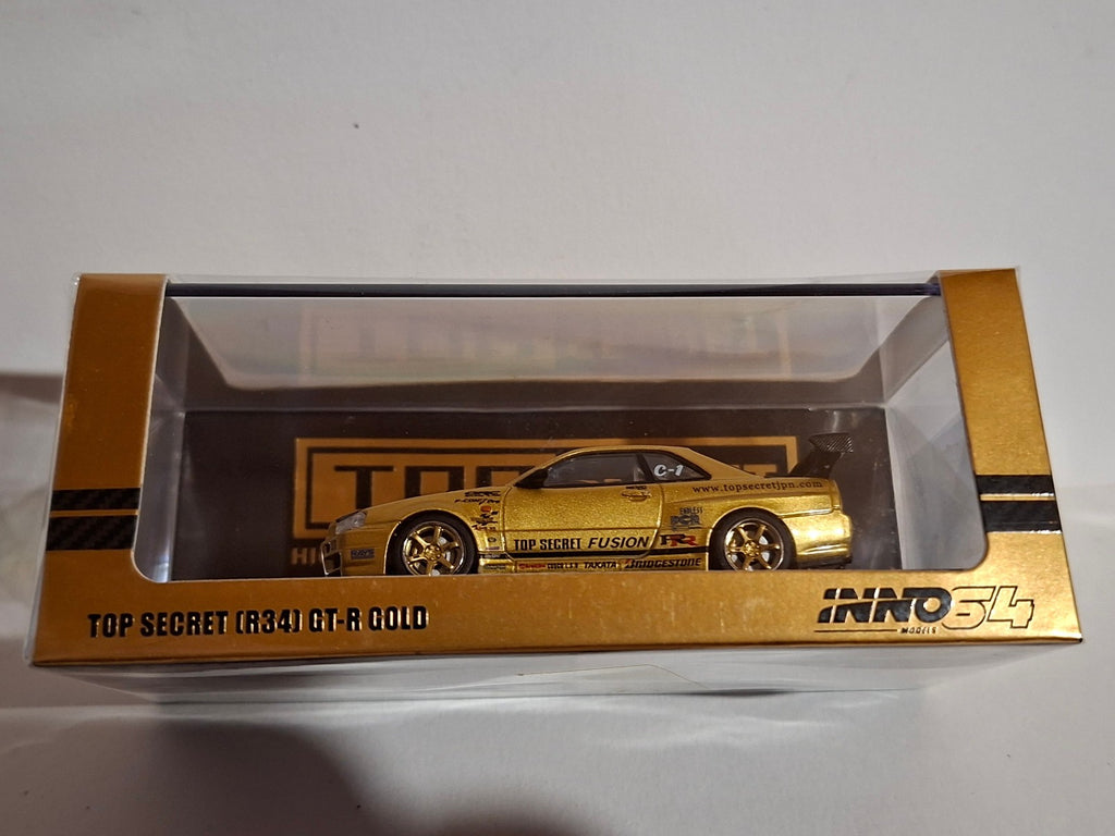 INNO64 Top Secret Nissan Skyline R34 GT-R, gold (CP18)