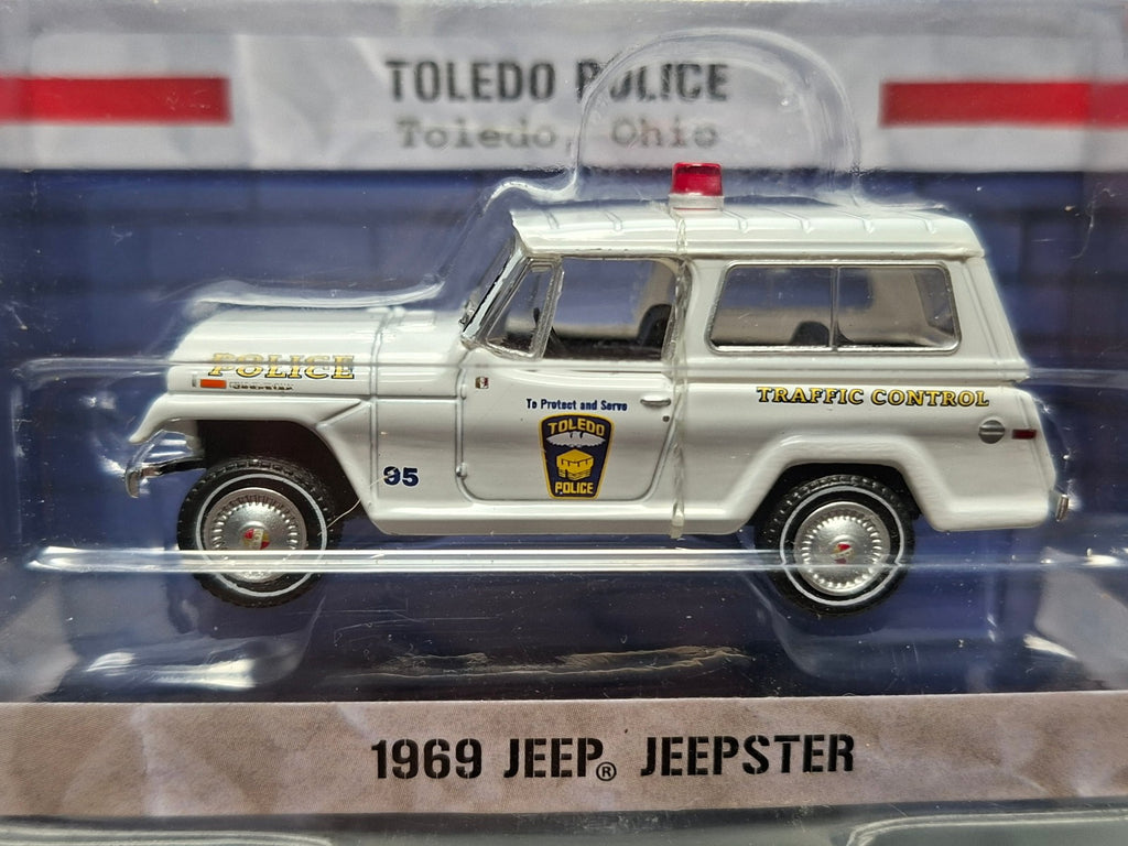 Greenlight Hot Pursuit 1969 Jeep Jeepster  Police Toledo (NG02)