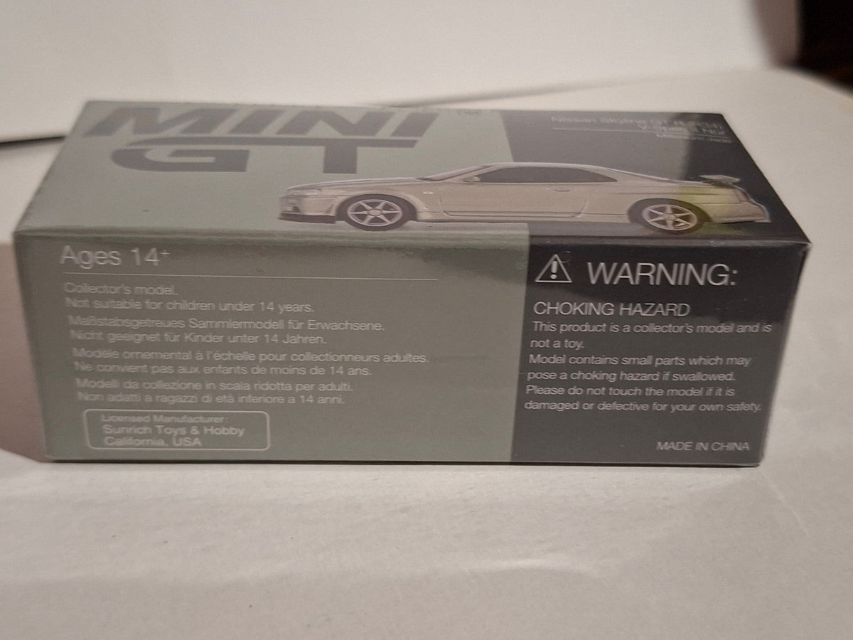 Mini GT 2002 Nissan Skyline GT-R R34 V-Spec II Nur millenium jade  n°1003 (CP17)