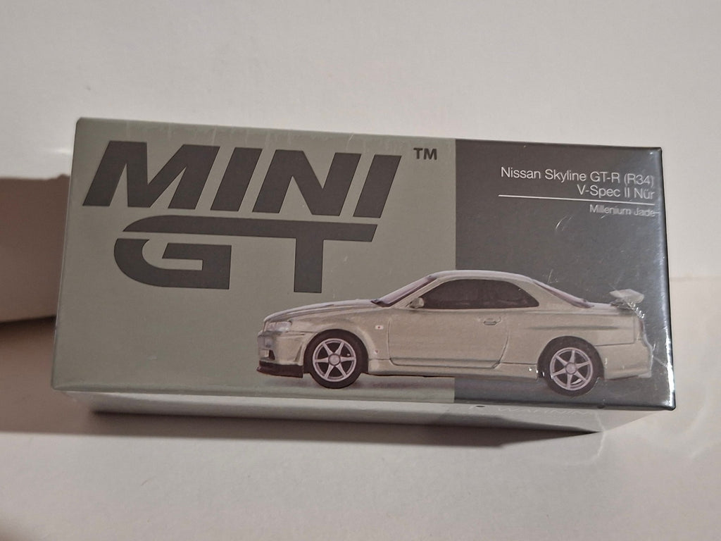 Mini GT 2002 Nissan Skyline GT-R R34 V-Spec II Nur millenium jade  n°1003 (CP17)