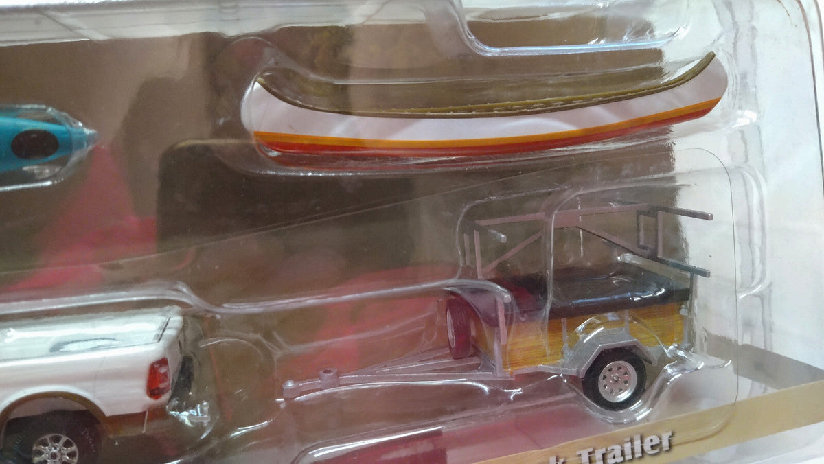 Greenlight Hitch & Tow 2022 Ram 2500 Limited Longhorn  & canoe (CT02)