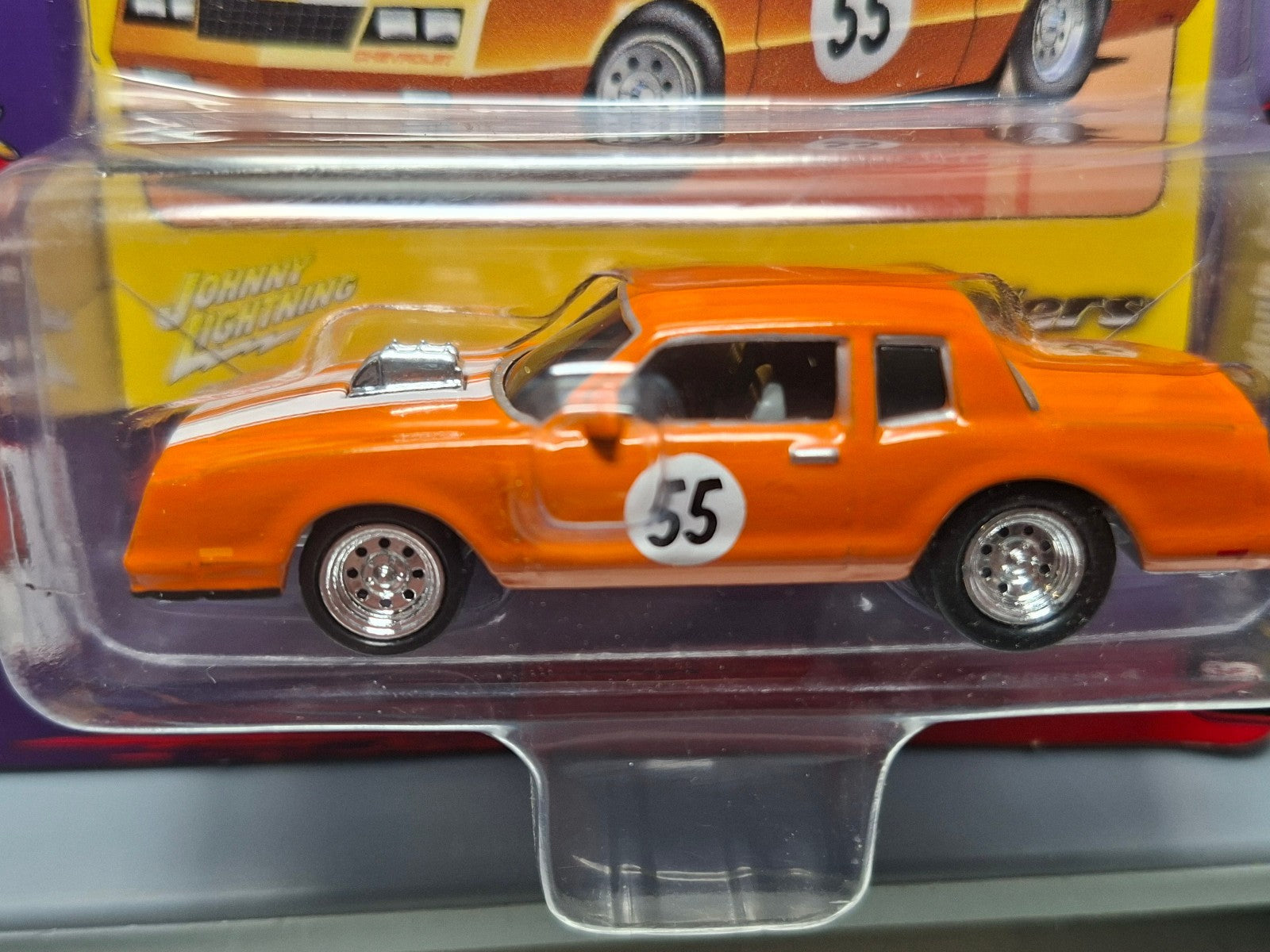 Johnny Lightning Street Freaks Spoilers Chevy Monte Carlo base blanche (NG04)