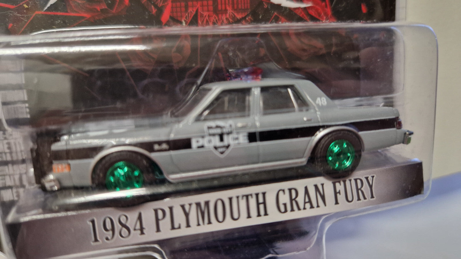 Greenlight chase Hollywood 1984 Plymouth Gran Fury (NG31)