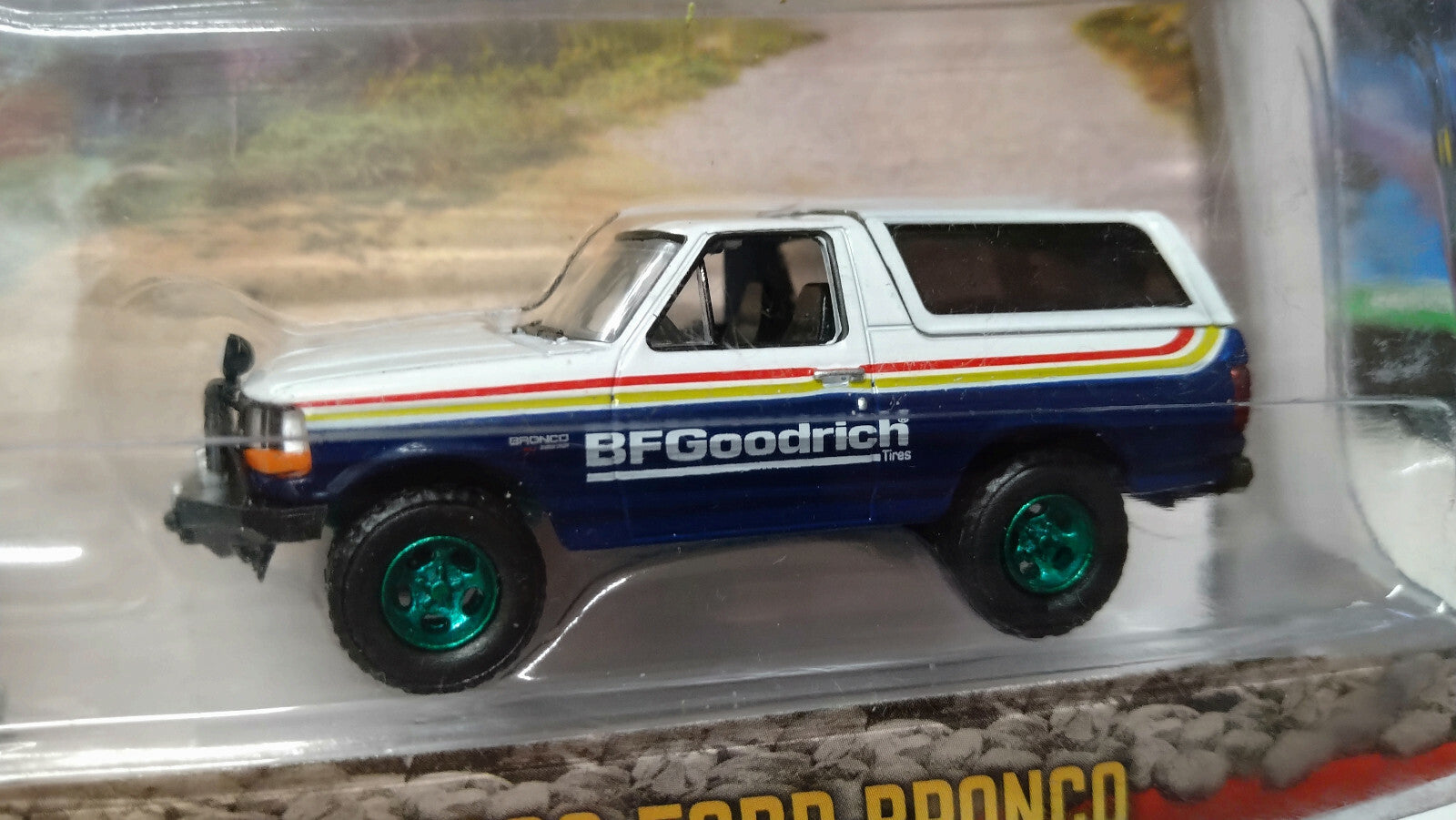 Greenlight Collectibles All-Terrain 1992 Ford Bronco Chase Green Wheels (NG75)