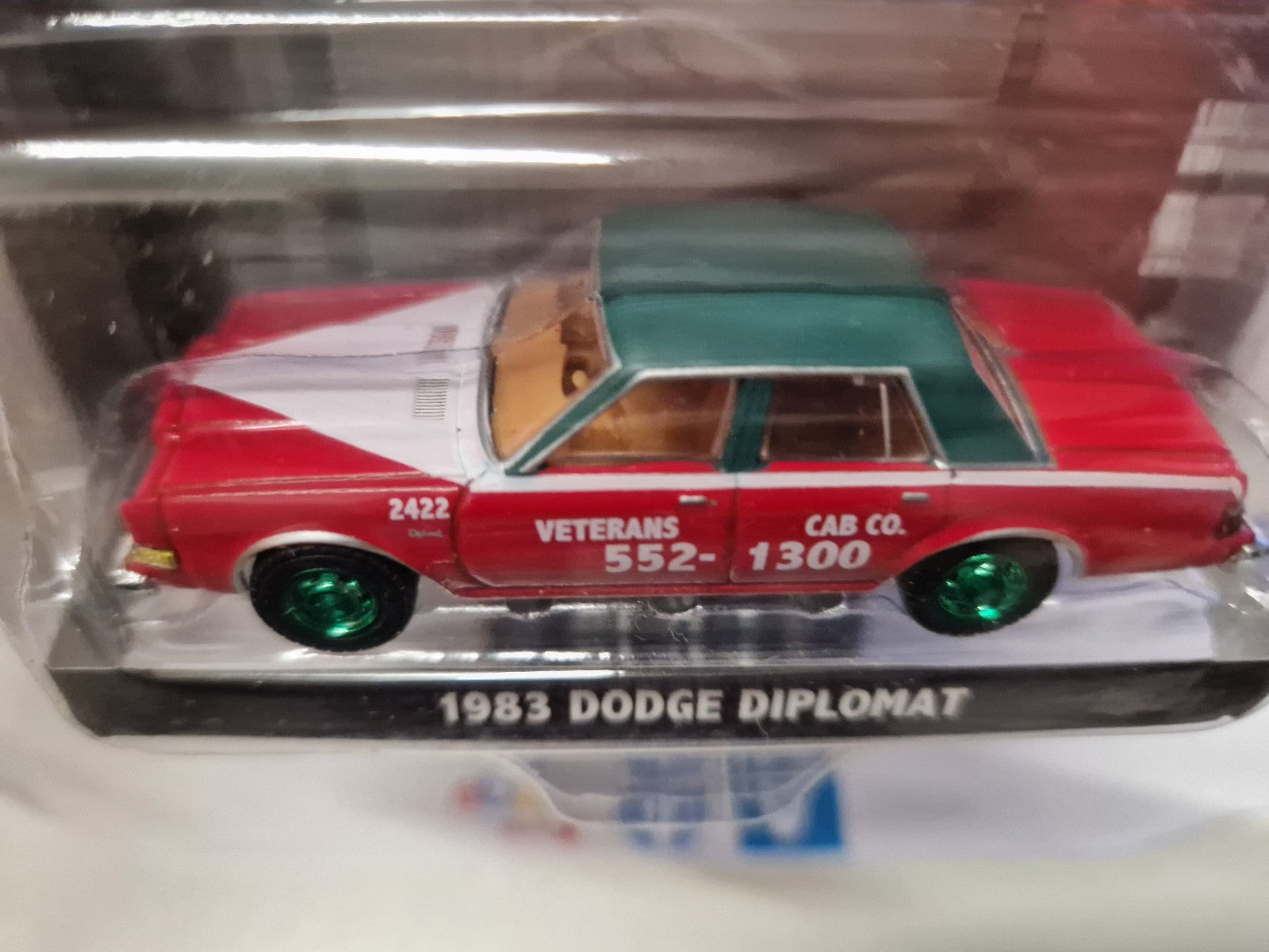 Greenlight Exclusive 1983 Dodge Diplomat Veteran's Chase green Wheels (NG50)