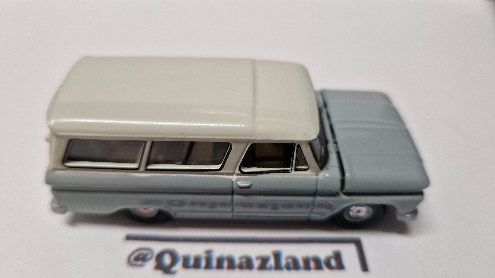 Auto World Premium series 1966 Chevrolet Suburban, gray body with white   (A31)