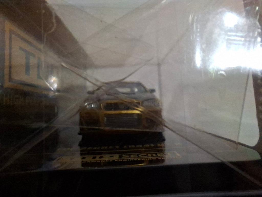 INNO64 Top Secret Nissan Skyline R34 GT-R, gold (CP18)