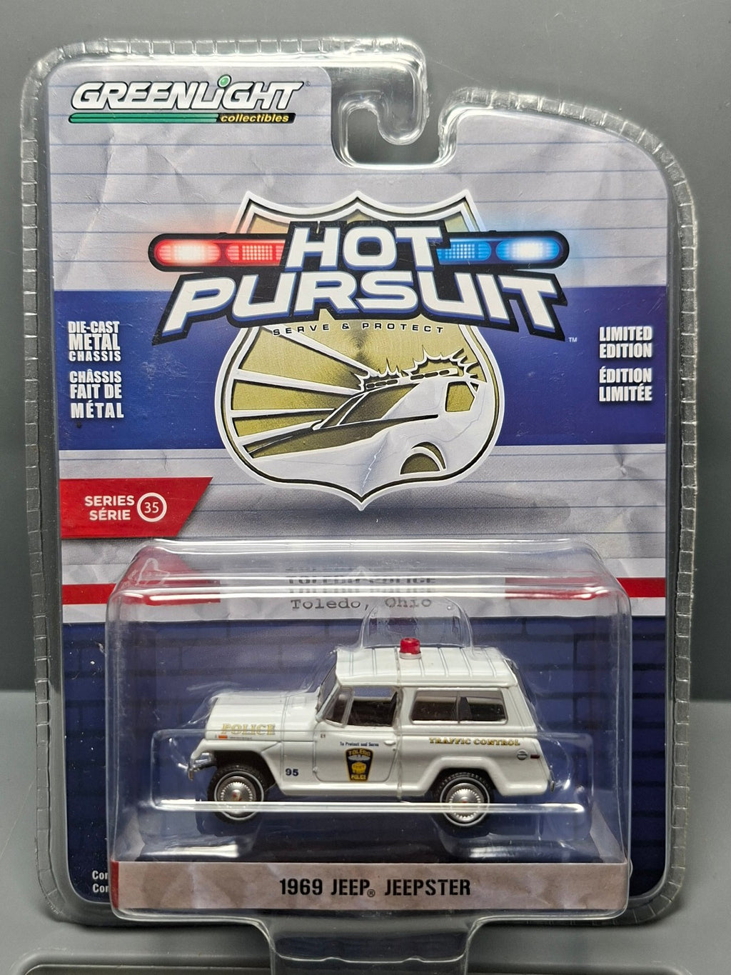Greenlight Hot Pursuit 1969 Jeep Jeepster  Police Toledo (NG02)