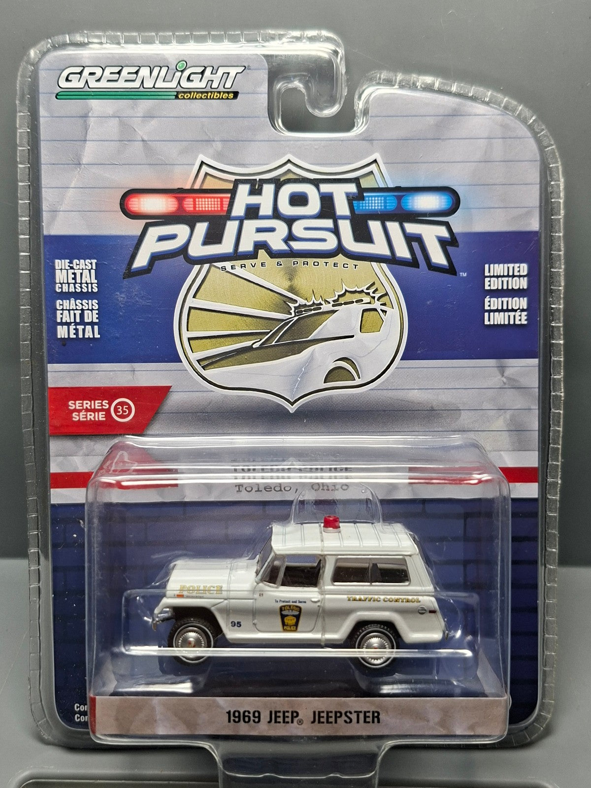 Greenlight Hot Pursuit 1969 Jeep Jeepster  Police Toledo (NG02)