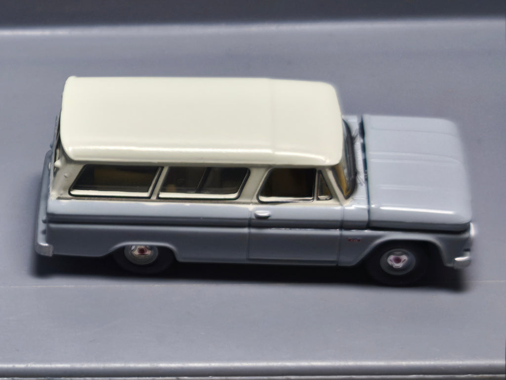 Auto World Premium series 1966 Chevrolet Suburban, gray body with white   (A31)