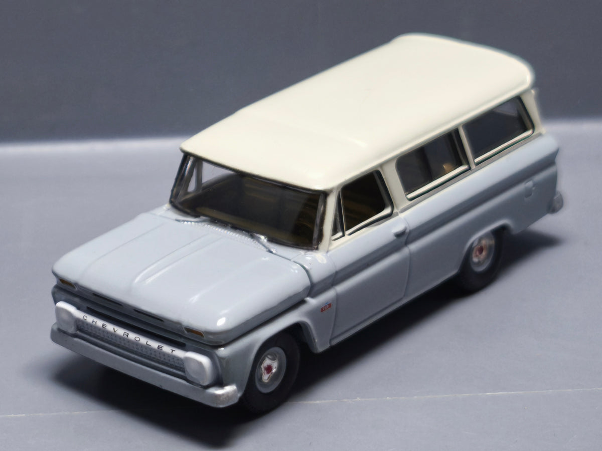 Auto World Premium series 1966 Chevrolet Suburban, gray body with white   (A31)
